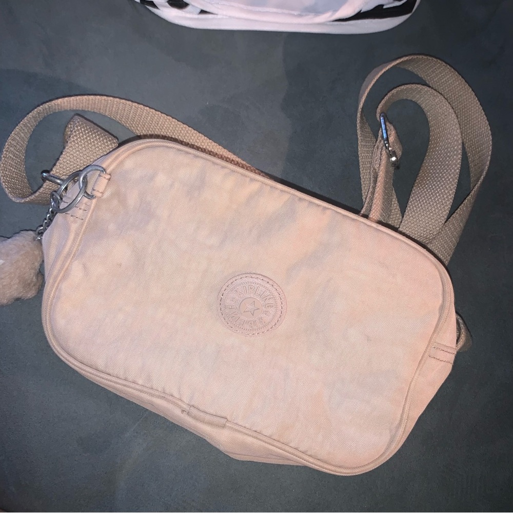 Kipling light beige cross body camera bag